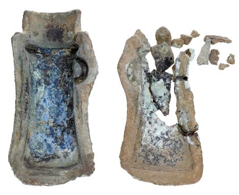 Bronze Age. a pair of socketed and looped axe moulds , c. 1000-800 BC., upper half 10.6 cm x 5.2 cm but missing left side whi