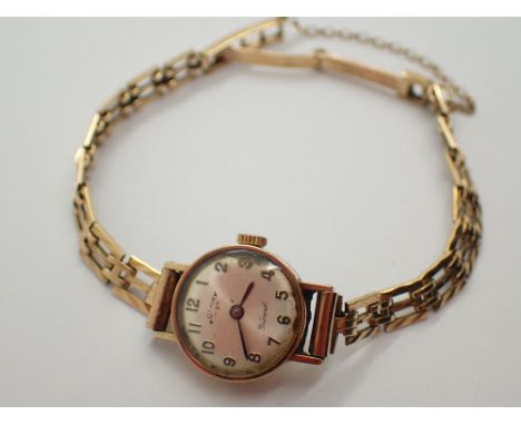 9ct gold ladies Rotary wristwatch on 9ct gold bracelet 13.7g total CONDITION REPORT: This item was working at the time of lot