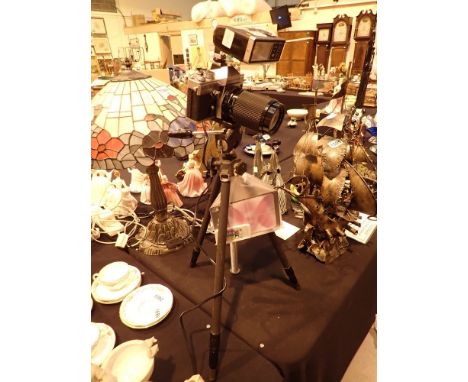 LED lamp in the form of a Praktica vintage film camera on tripod with remote control and colour changer 