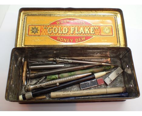 Cigarette box containing vintage pencils including silver 