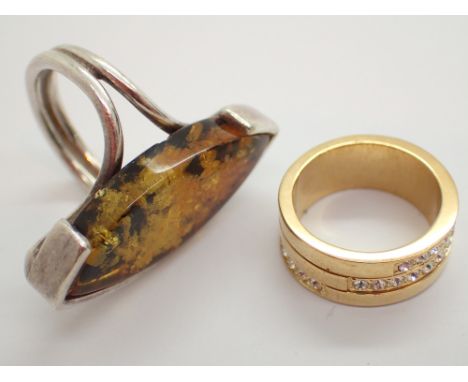 Silver and amber ring and a Swarovski crystal set ring 