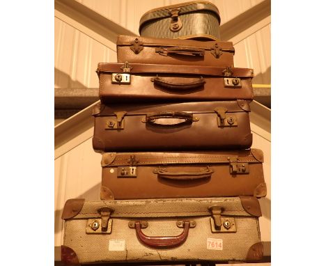Six vintage suitcases 
