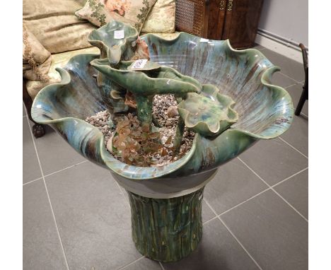Large tin glazed ceramic garden water feature with lilly and bind figure on matching simulated bamboo pedestal