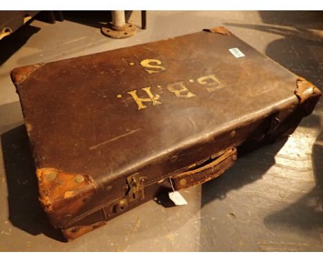 Vintage leather suitcase with gold initials in large letters 