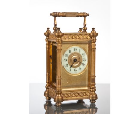 LATE 19TH-CENTURY FRENCH BRASS CARRIAGE TIMEPIECE 
with fluted column case, the dial with gilt panel and Arabic numeral chapt