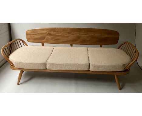 ERCOL 'SURFBOARD' SOFA, 205cm W, elm and beech slatted with seat cushions and surfboard back. 