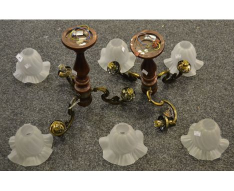 A pair of contemporary turned mahogany three branch chandelier, twisted and frilled shades (2)
