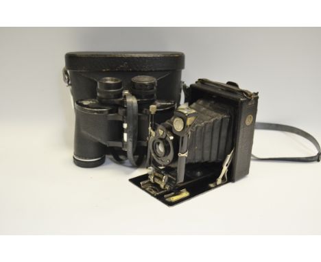 A collectable early 20th Century Cameo Mark One folding camera with Rollex Patent Film Back; a set of Pentax 8 x 40 binocular