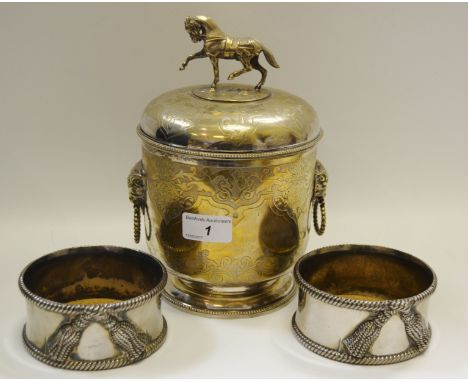 An Edwardian E.P.N.S ice bucket, hinged cover with horse finial, c.1910; a pair of silver plated coasters, later (3)