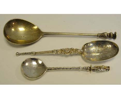 A large seal top spoon , London 1934; two large spoons, London 1909 and 1895, 133.2g
