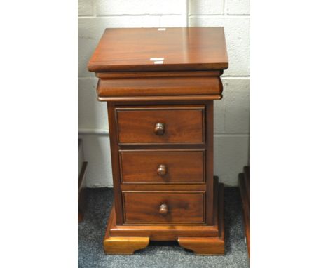 A pair of contemporary bedside tables, blind drawer to frieze, above three long drawers, stepped base, bracket feet