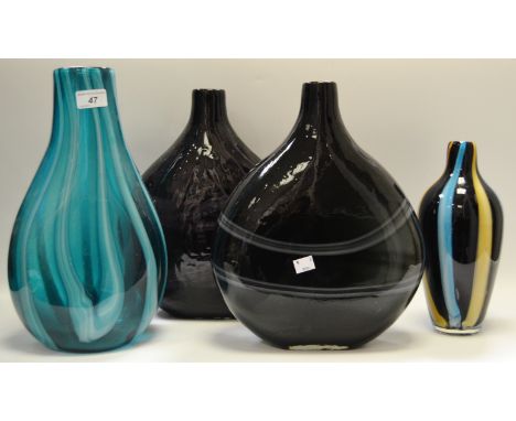 A pair of large amethyst glass moon vases; a large art glass baluster vase, another (4)