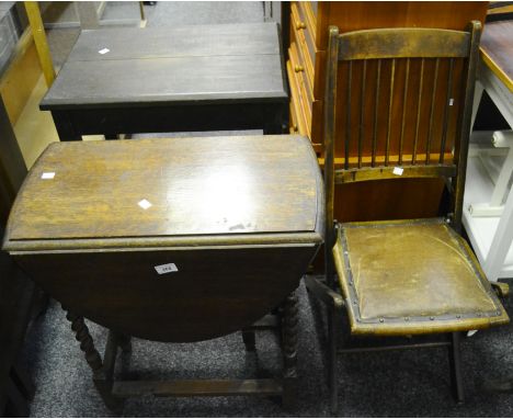 An early 20th century oak gateleg table; a painted pine hall table, refrectory undertier; a 19th century stick back collapsib