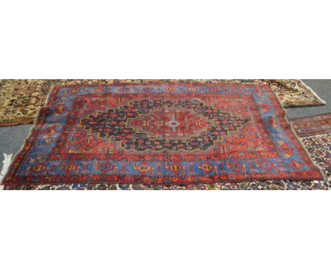 A Persian Bakhitiari carpet 314 x 167 cm