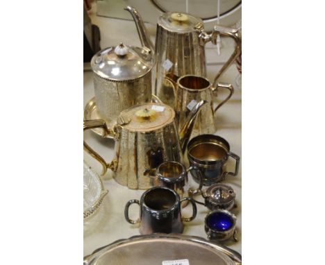 Silver Plated Ware - a four piece silver plated tea service, chased and engraved overall, mother of pearl finial; a Sheffield