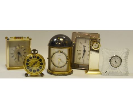 Clocks - a novelty silver plated Rivo desk clock table lighter combination;  a Europa alarm clock; etc (6)