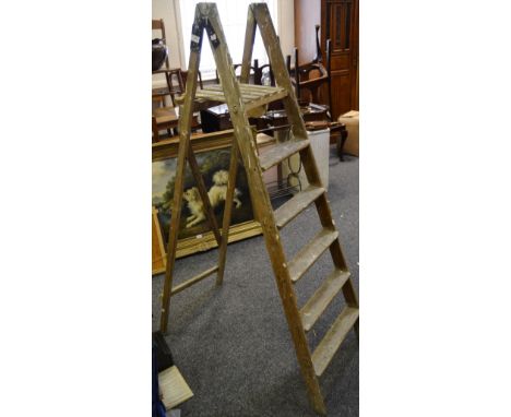 A set of mid 20th century paint splatted step ladders