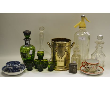 A Schweppes Soda Siphon;  a green glass and silvered overlaid decanter and glasses;  other decanters;  a wine bottle holder; 