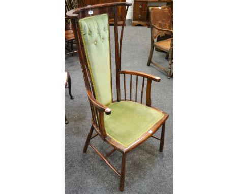 An early 20th century stick back open armchair, H stretcher 