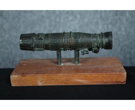 Aviation interest. A bronze jet engine on a wooden stand. Probably an early Rolls Royce engine. H.8 W.18 cm. 