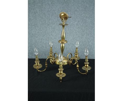 A modern brass chandelier with five branches of lights. H.47 Dia.50cm. 