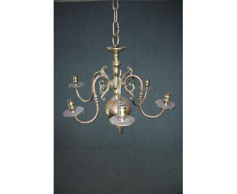 A brass chandelier with six branches of lights. H.50 Dia.57cm.