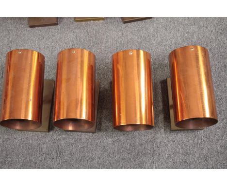 Four vintage brass and copper wall mounted downlights. L.23 Dia.13 cm. (each) 