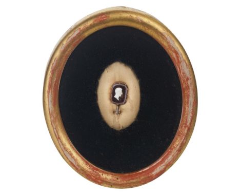 * Duke of Wellington. A Victorian agate cameo brooch, carved with a bust of the Duke of Wellington facing right, set in yello