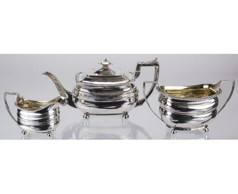 * Tea Service. A matched George III silver three-piece tea set, comprising teapot by Alice and George Burrows, London 1811, m