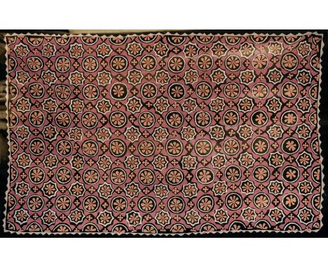 * Africa. A large appliqué panel, probably African, early 20th century, hand-stitched cotton, with pink and white appliqués f