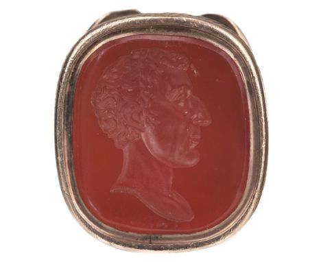 * Duke of Wellington. A Victorian yellow metal seal fob, set with a carnelian panel carved with an intaglio bust of the Duke 