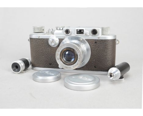 A Leica IIIa Rangefinder Camera, chrome, serial no 202749, 1936, with a Leitz Elmar 50mm f/3.5 collapsible lens, serial no 23