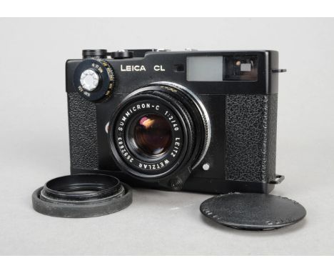 A Leica CL Rangefinder Camera, black, serial no 1330592, 1973/4, body G, shutter not working, with a Summicron-C 40mm f/2 len