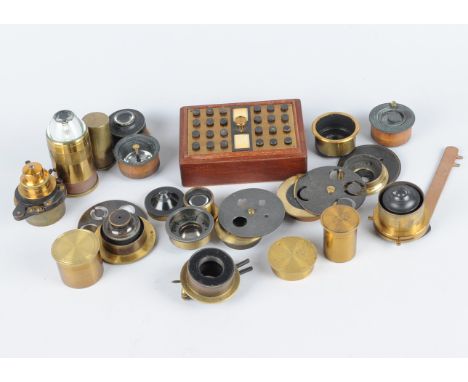 19th Century lacquered brass Microscope Condensers and  Accessories, including parabolic, wheel of patch stops, stops, in cas