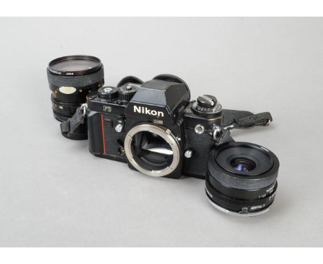 A Nikon F3 SLR Camera, black, serial no 1334791, shutter not working, condition F, cover missing from manual release lever, s