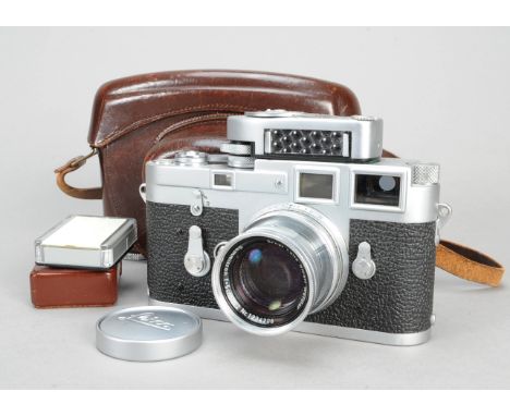 A Leica M3 Double Stroke Rangefinder Camera, chrome, serial no 866434, 1957, with a Leitz Summicron 5cm f/2 lens, no 1234026,