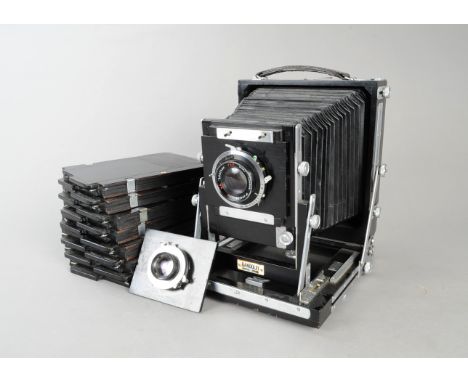 A Gandolfi Black Painted Mahogany and Nickel-Plated Brass Half-Plate Field Camera, with three original lens boards with Wray 