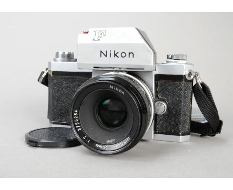 A Nikon F Photomic T SLR Camera, chrome, serial no 6733643, shutter working, body G, age-related wear to edges and metal, wit