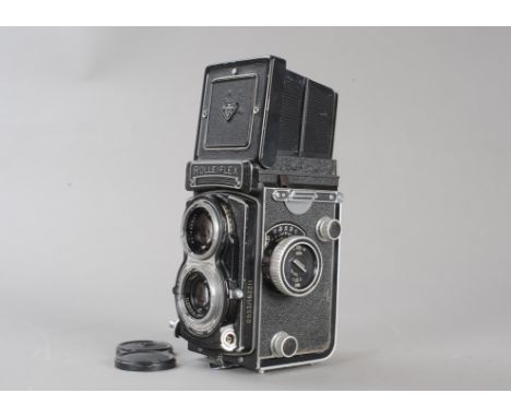 A Rolleiflex T Model 2 TLR Camera, serial no 2159882, with government serial no 0553/162211 engraved on left hand side, with 