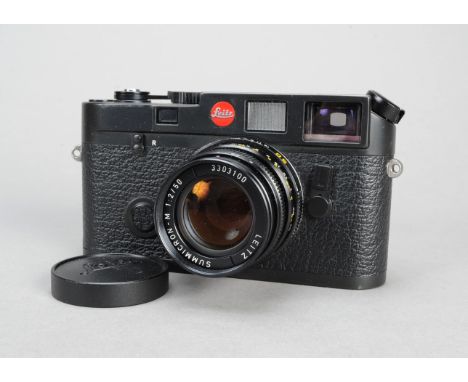 A Leica M6 Rangefinder Camera, black, serial no 1658498, 1984/5, body VG, shutter working, with a Leitz Summicron-M 50mm f/2 