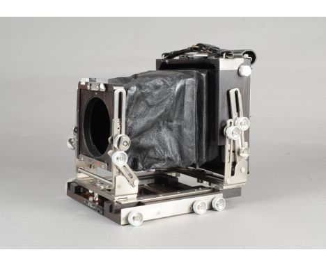 A Japanese Ebony SV45 TE  5x4 Field Camera, macassar ebony wood, titanium and leather construction, condition overall VG, wor