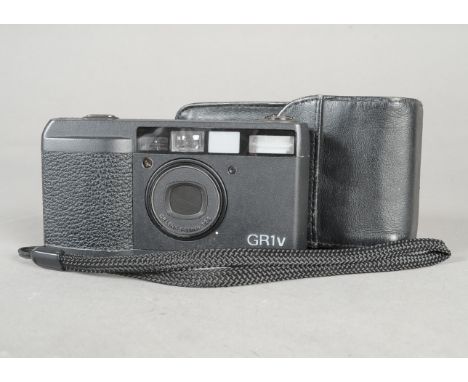 A Ricoh GR1V Compact Camera, black, serial no 54 101050, shutter working, with GR 28mm f/2.8 lens and maker's soft case