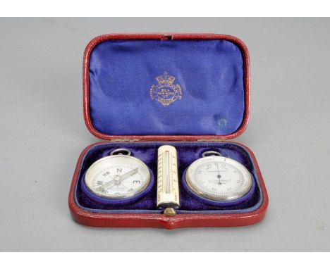 A late 19th Century Callaghan &amp; Co Silver Aneroid Barometer Compendium,  aneroid and compass, both 47mm diam., with suspe
