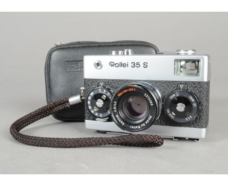 A Rollei 35 S Compact Camera, made by Rollei Singapore, chrome, serial no 37 4311, with Rollei- HFT Sonnar 40mm f/2.8 lens, b