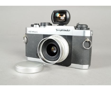 A Voigtländer Bessa-L Camera, chrome, serial no 0050736, shutter working, condition G, staining on top plate, with a Snapshot