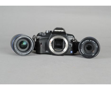 An Olympus E-410 Four Thirds DSLR Camera, serial no D56581175, working, condition E, in maker's box, a Zuiko Digital 14-42mm 