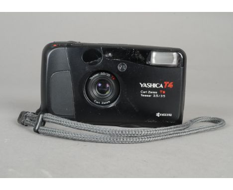 A Yashica T4D  Compact Camera, black, serial no 064864, shutter working, condition VG, with Carl Zeiss Tessar T* 35mm f/3.5 l