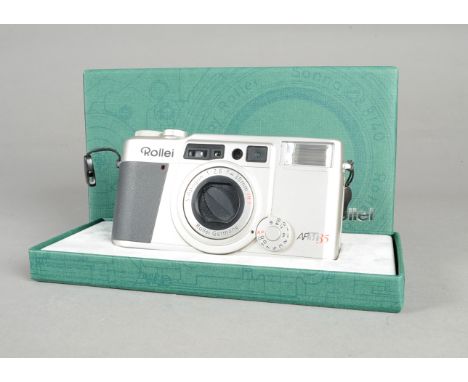 A Rollei AFM 35 Compact Camera, serial no 6003625, powers up, condition E, complete with maker's presentation box and instruc