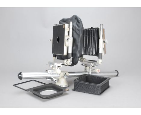 A Linhof Kardan Bi-System 5 x 4 Monorail Camera, with bag bellows, bellows, focusing screen, two lens boards, grey enamelled 