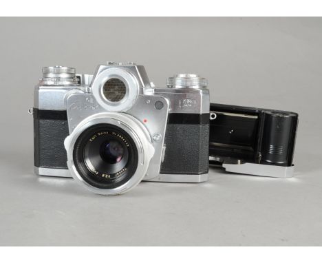 A Zeiss Contarex "Bullseye" SLR Camera, serial no Z 20744, with Zeiss Tessar 50mm f/2.8 lens, interchangeable magazine back a